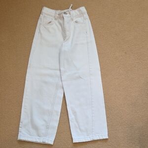 white, wide-leg denim jeans with a drawstring waist